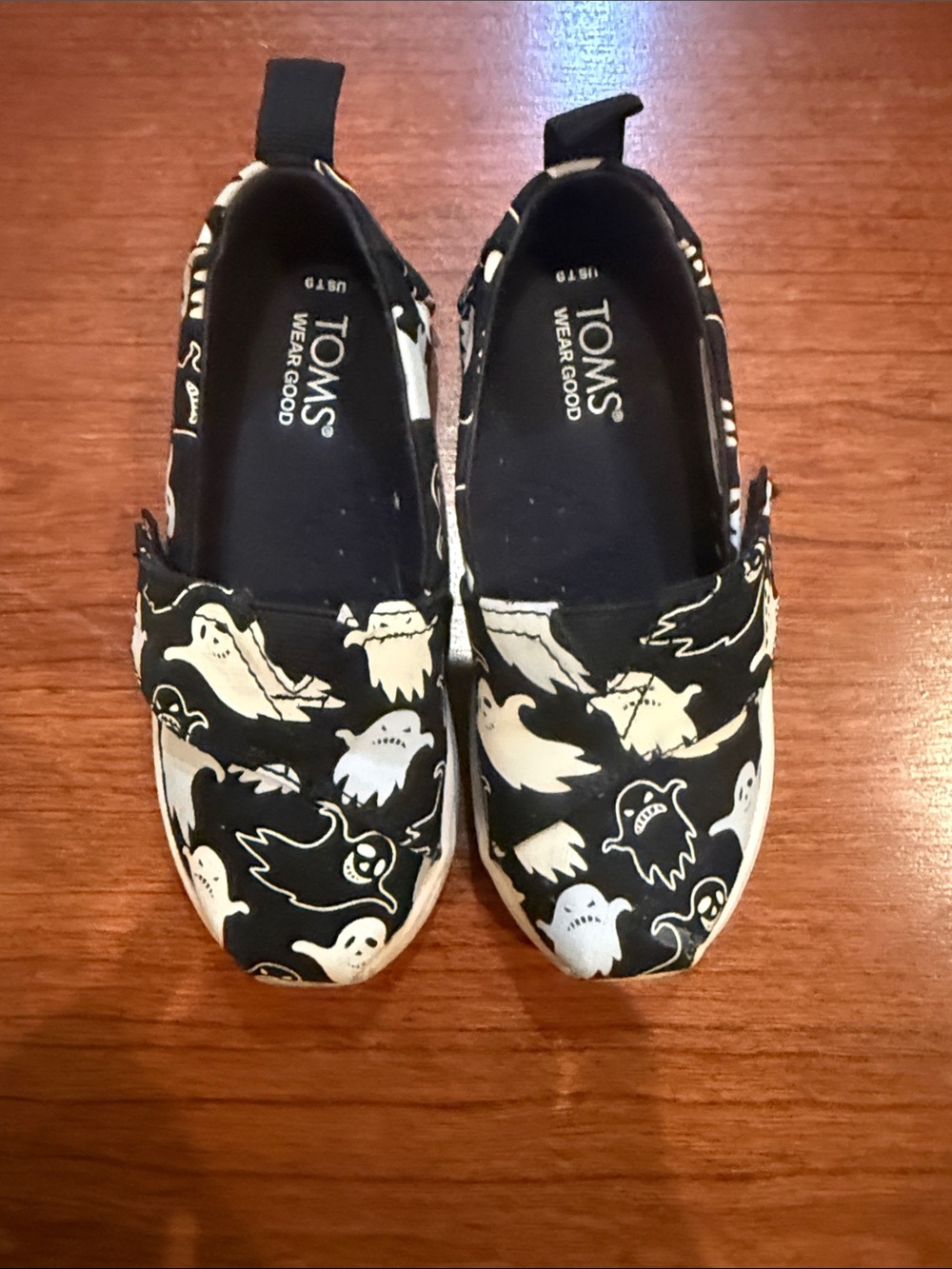 TOMS Kids Black Slip-On Sneakers with White Ghost Print